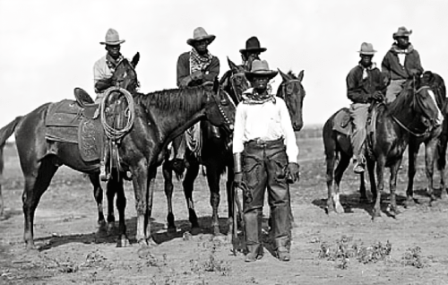 Black Cowboys in a group some mounted