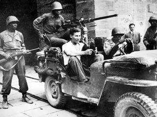 Buffalo soldiers guarding German POWs during WW Two .