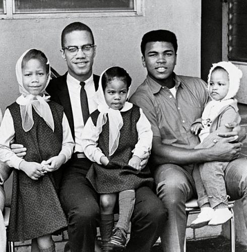 Malcolm-X with his children and Ali and his 10