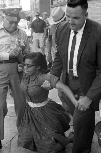 Tallahassee student civil rights leader Patricia Stephens beig arrested on Feb. 13_ 1960 as she led student demonstrations to desergegate lunch counters in the city. She later married Attorney John Du